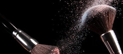 Makeup brushes with powder