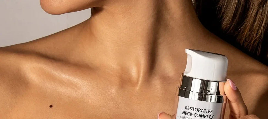 Alastin product next to woman's decollete