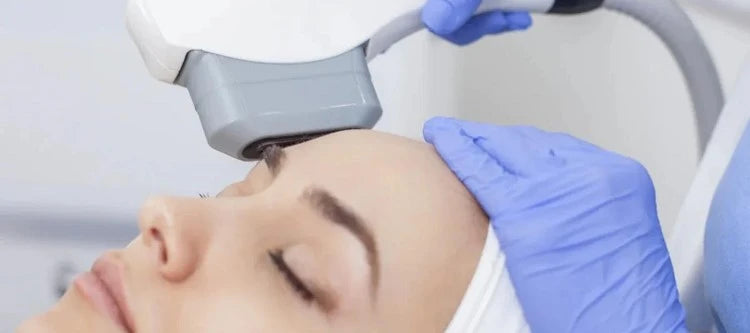 Woman receiving a laser treatment to face