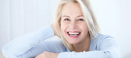 Older woman smiling at the camera