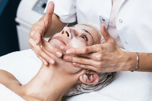 Woman getting face massaged
